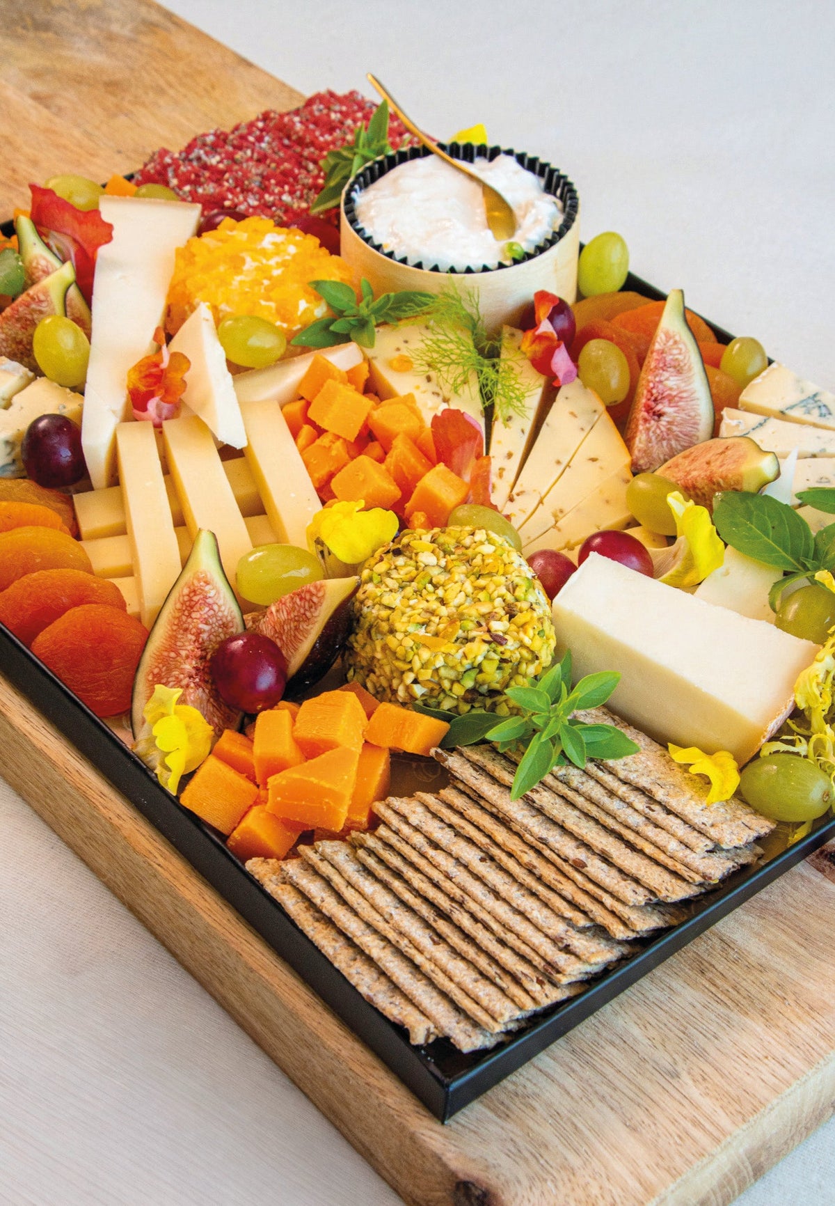 Cheese and fresh fruit platter, prepared by C-Gastronomie in Abu Dhabi