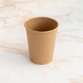 Kraft paper cup 28 cl on marble