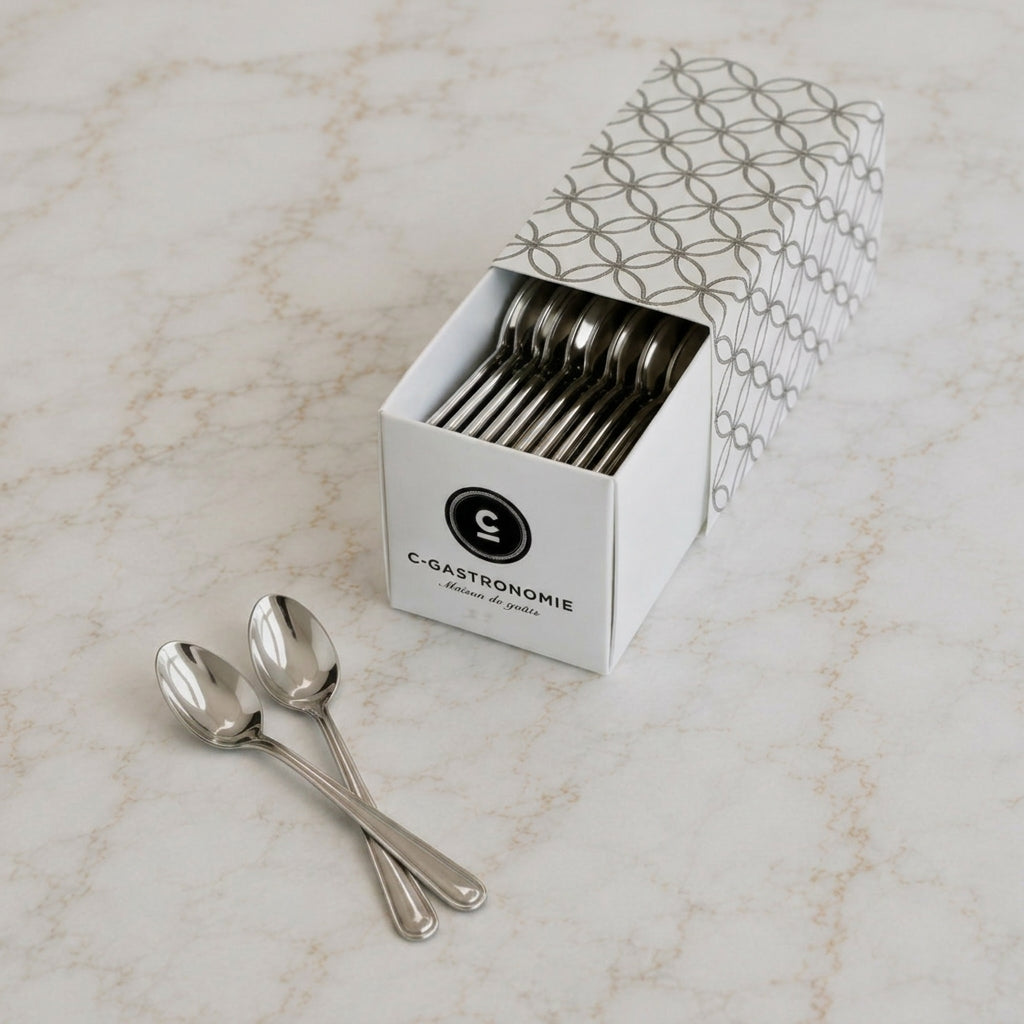 Box of C-Gastronomie stainless steel cocktail spoons on marble