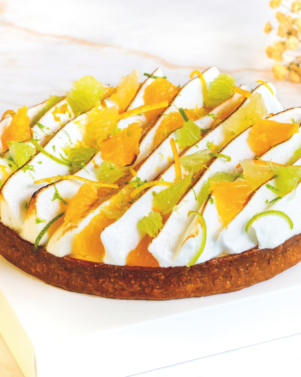 Citrus zest tart, prepared by C-Gastronomie in Abu Dhabi