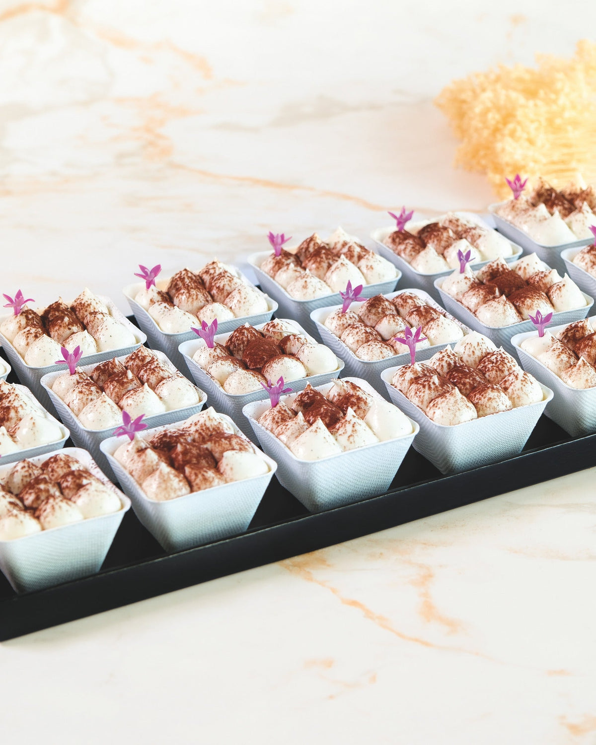 Coffee tiramisu verrine platter, prepared by C-Gastronomie in Abu Dhabi