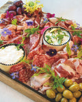 Cold cuts and pickles platter, prepared by C-Gastronomie in Abu Dhabi