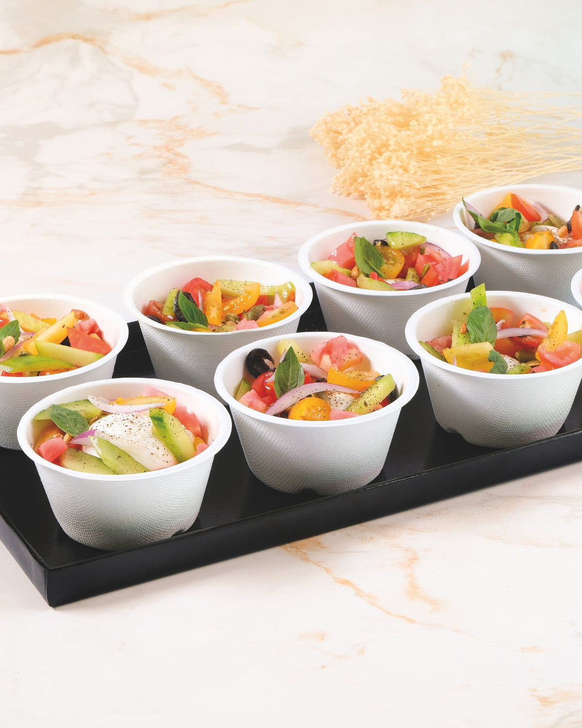 Creamy burrata cups, prepared by C-Gastronomie in Abu Dhabi