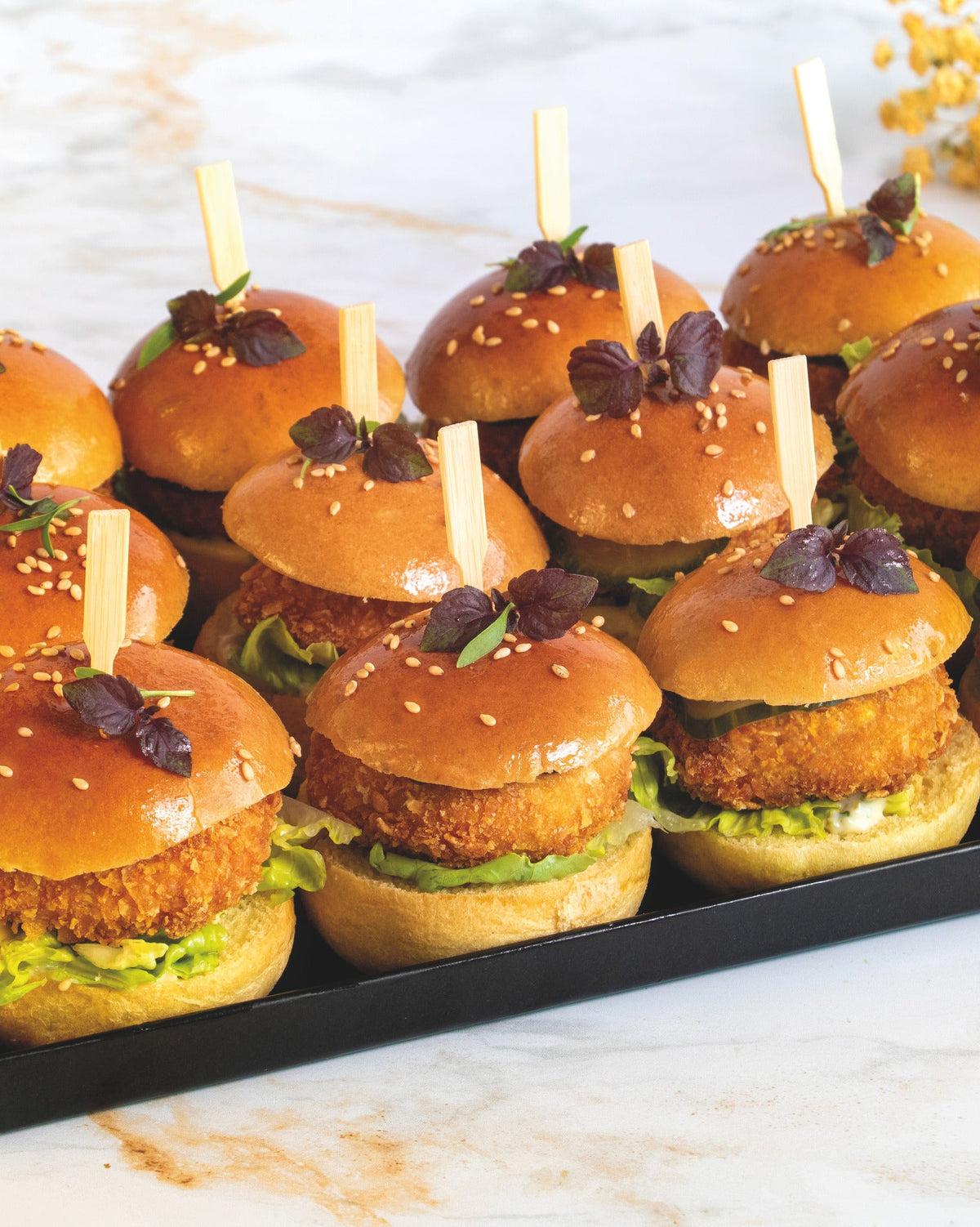 Crispy chicken burger platter, prepared by C-Gastronomie in Abu Dhabi