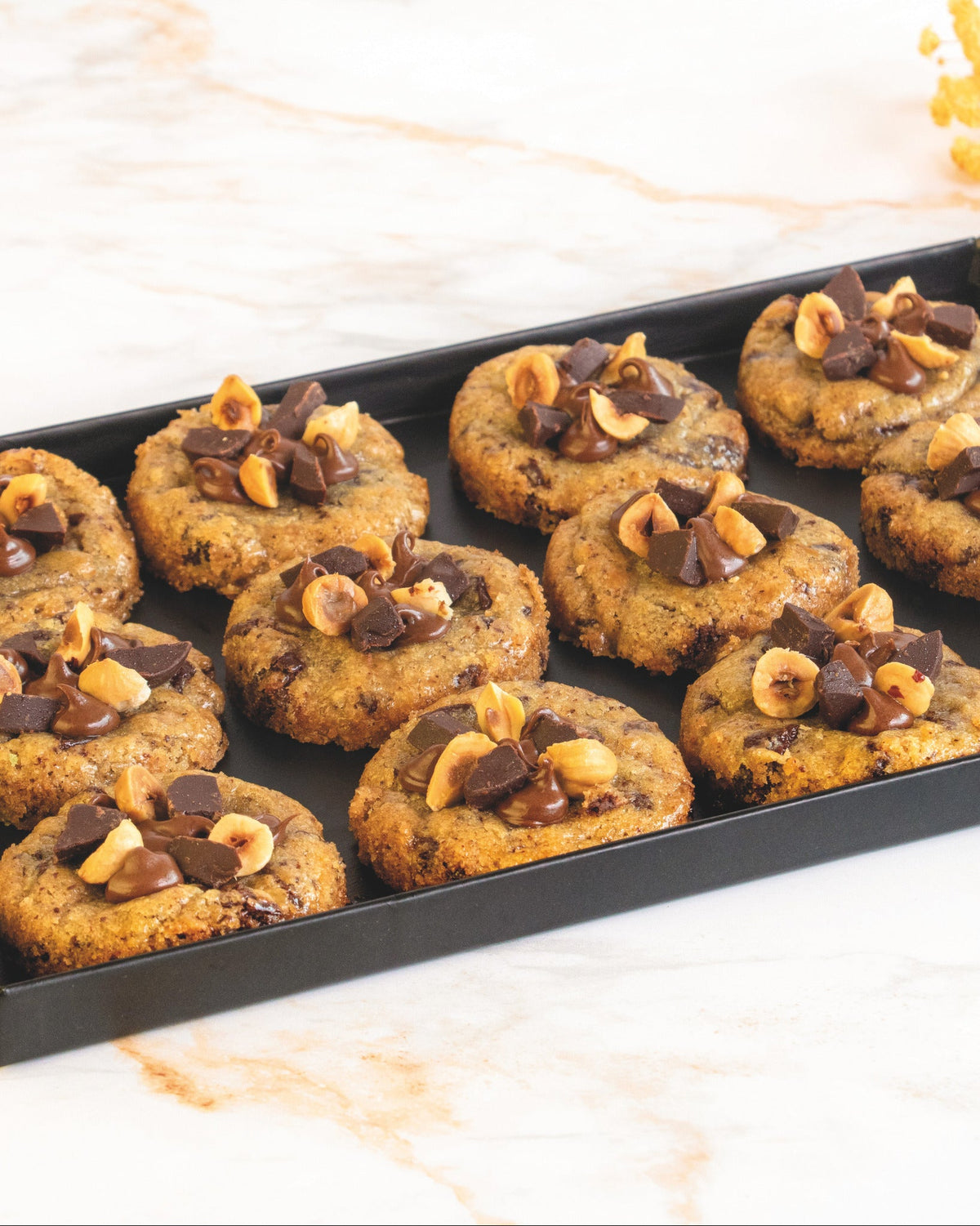 Dark chocolate and hazelnut cookie platter, prepared by C-Gastronomie in Abu Dhabi