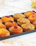 Financier platter, prepared by C-Gastronomie in Abu Dhabi