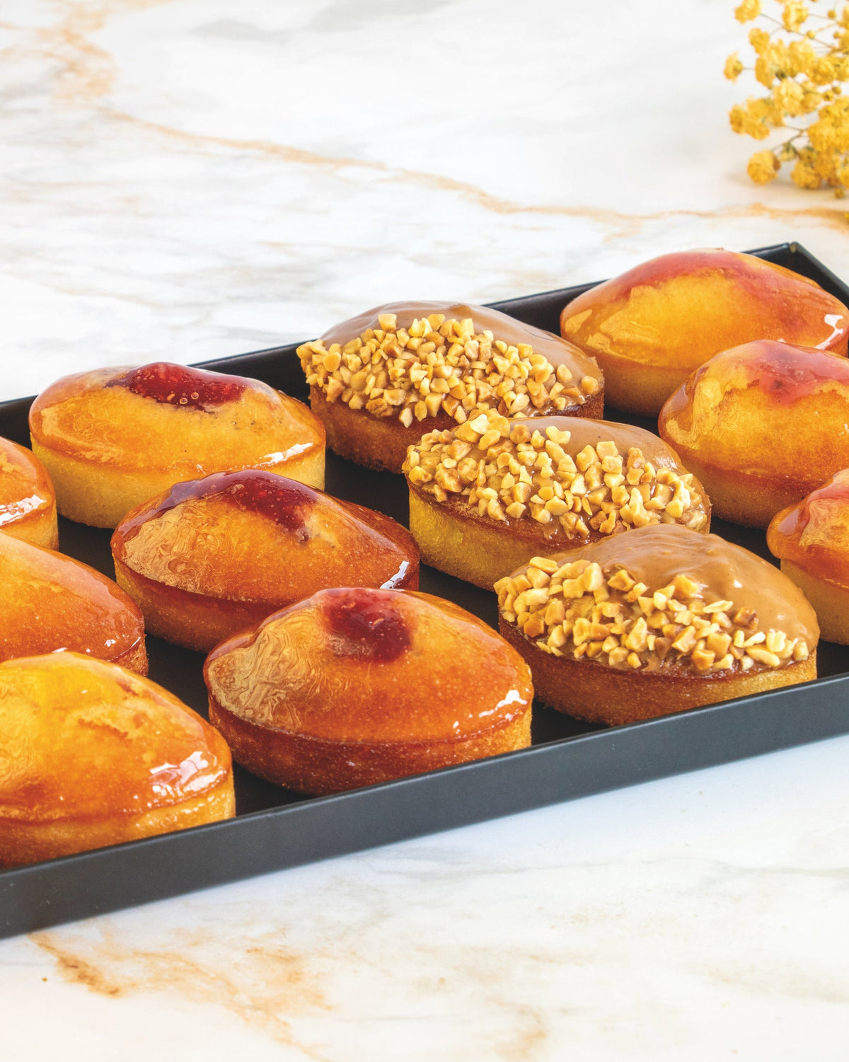 Financier platter, prepared by C-Gastronomie in Abu Dhabi