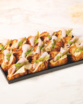 Ham and Comte croissant platter, prepared by C-Gastronomie in Abu Dhabi