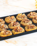 Milk chocolate and pecan cookie platter, prepared by C-Gastronomie in Abu Dhabi