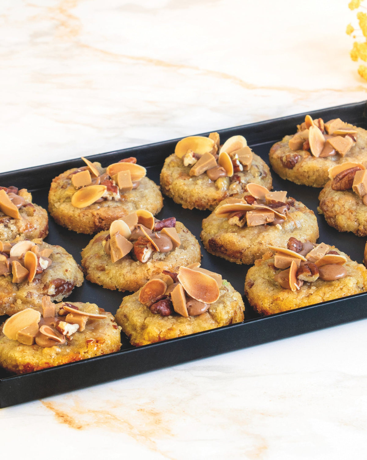 Milk chocolate and pecan cookie platter, prepared by C-Gastronomie in Abu Dhabi