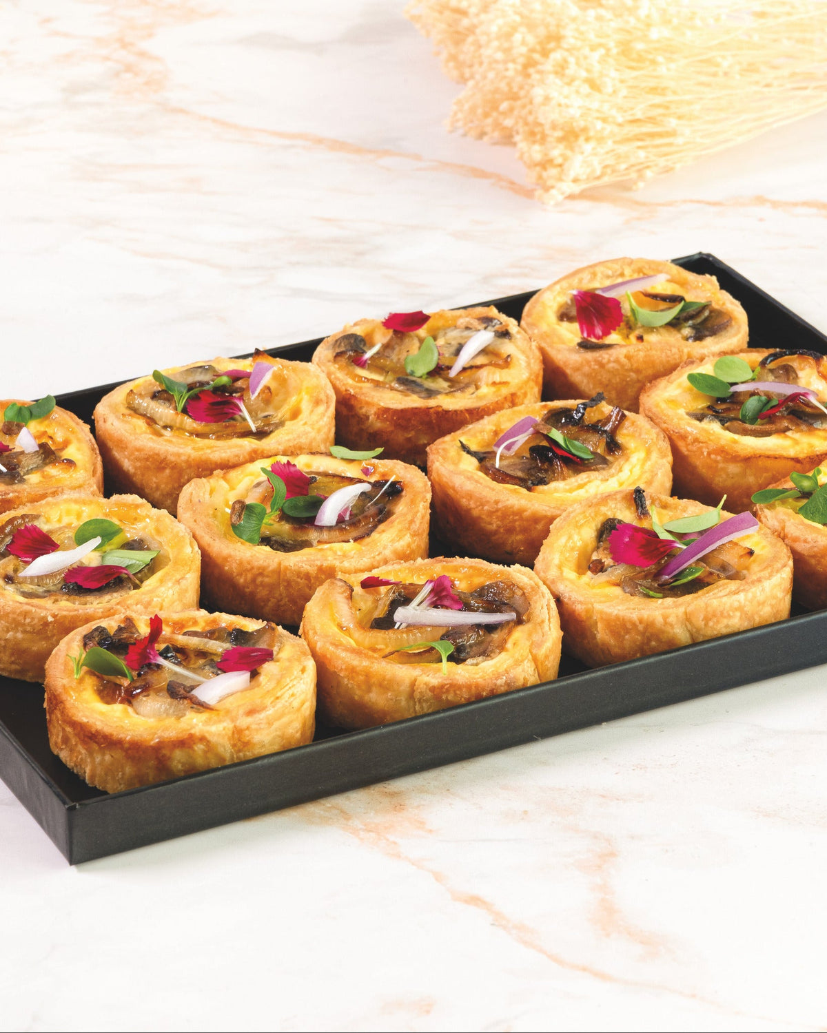 Mushroom quiche platter, prepared by C-Gastronomie in Abu Dhabi