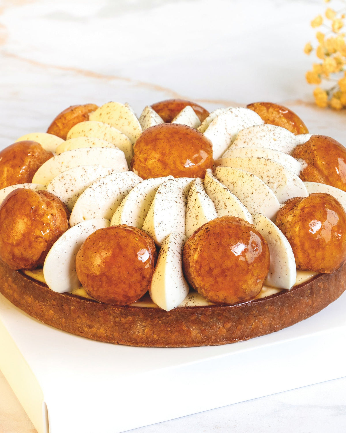 Saint-Honore tart, prepared by C-Gastronomie in Abu Dhabi