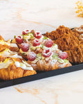 Signature filled croissant platter, prepared by C-Gastronomie in Abu Dhabi