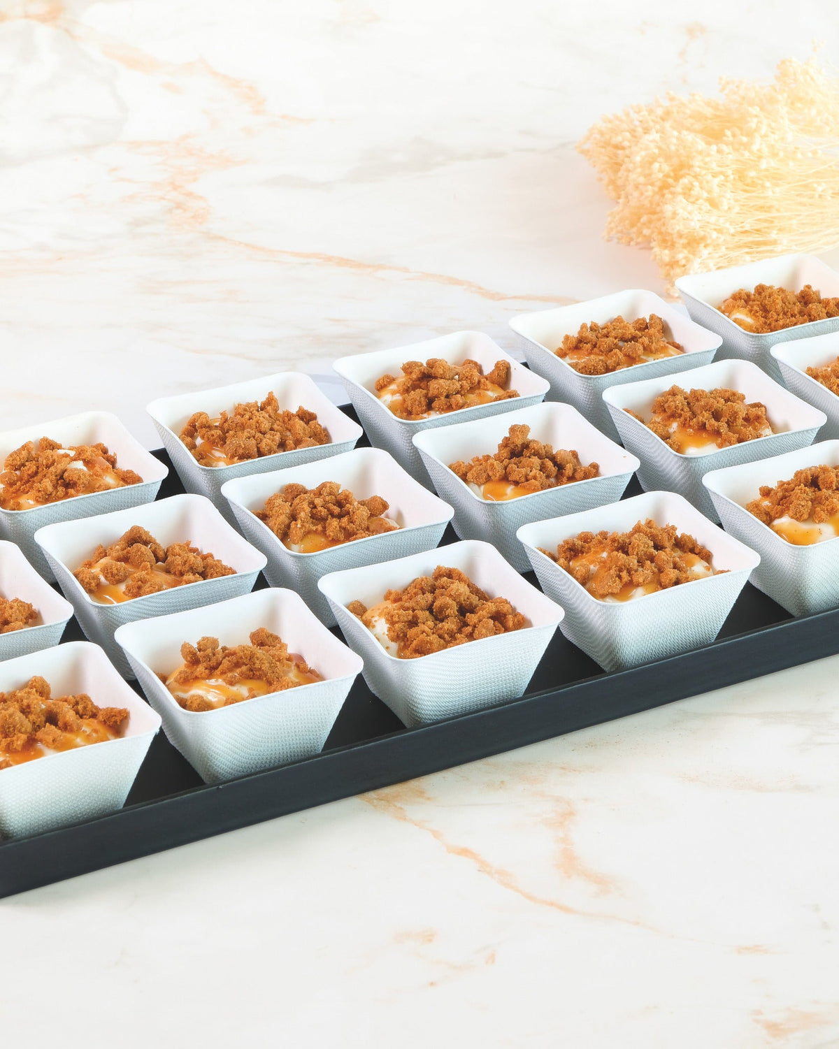 Speculoos cheesecake verrine platter, prepared by C-Gastronomie in Abu Dhabi