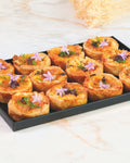 Three-cheese quiche platter, prepared by C-Gastronomie in Abu Dhabi