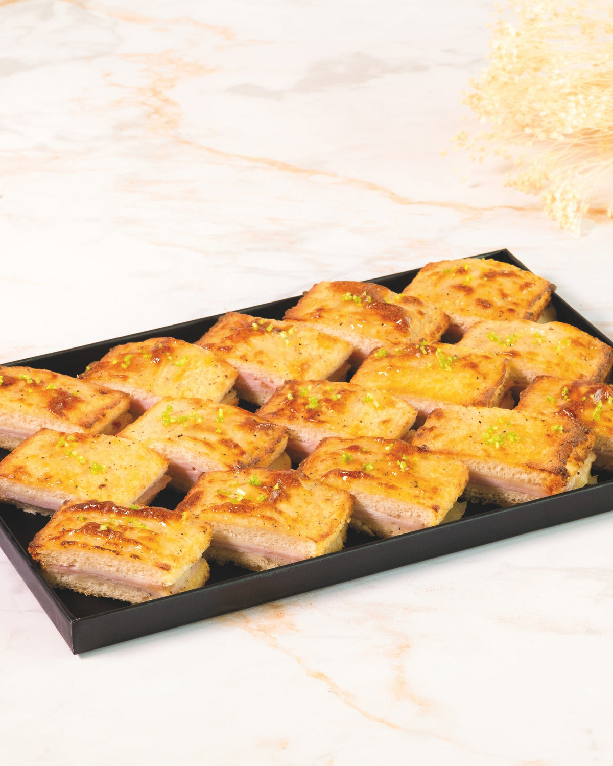 Truffle ham croque-monsieur platter, prepared by C-Gastronomie in Abu Dhabi
