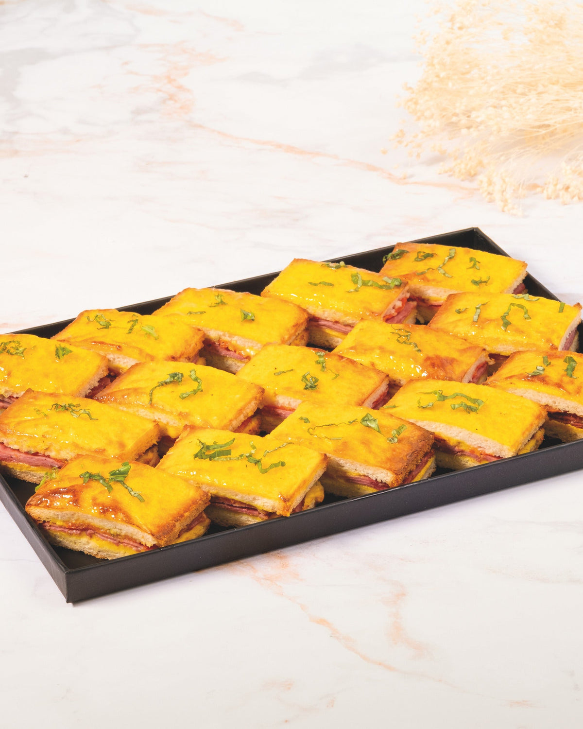 Turmeric pastrami croque-monsieur platter, prepared by C-Gastronomie in Abu Dhabi