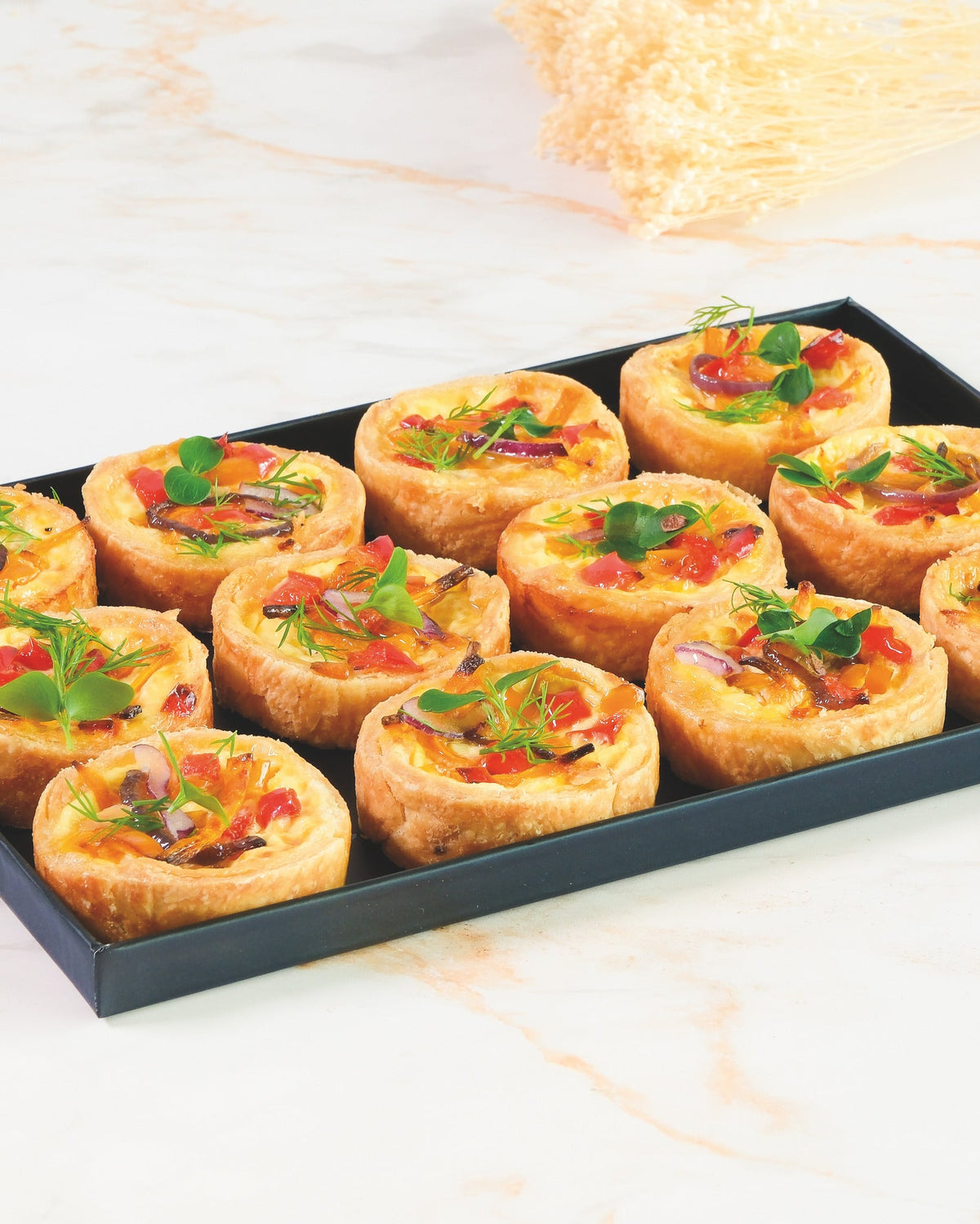 Vegetarian quiche platter, prepared by C-Gastronomie in Abu Dhabi